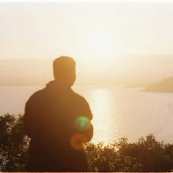 A serene landscape with calm water, representing mental clarity and peace.