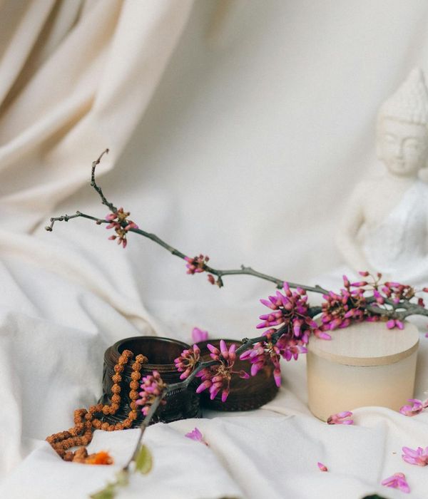 Woman in a peaceful meditative pose, symbolizing harmony and inner calm.
